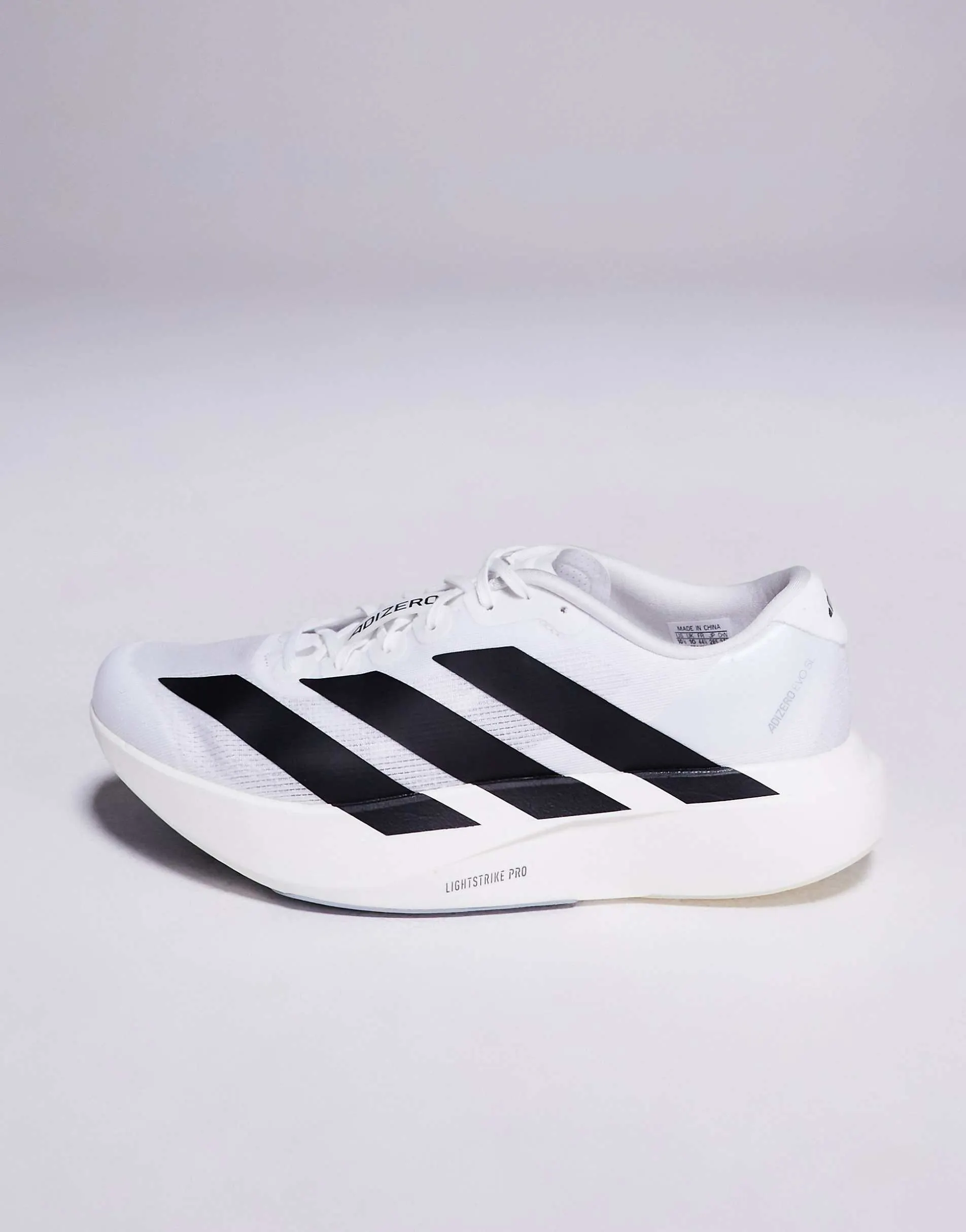 adidas Running Adizero EVO SL trainers in white and black