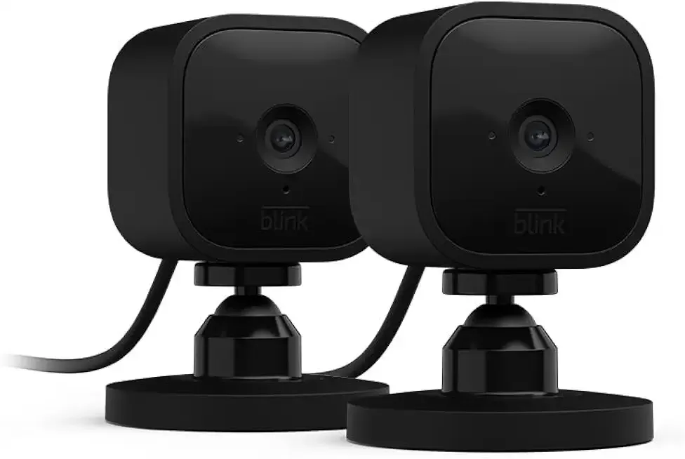 Blink Mini - Compact indoor plug-in smart security camera, 1080p HD video, night vision, motion detection, two-way audio, easy set up, Works with Alexa – 2 cameras (Black)