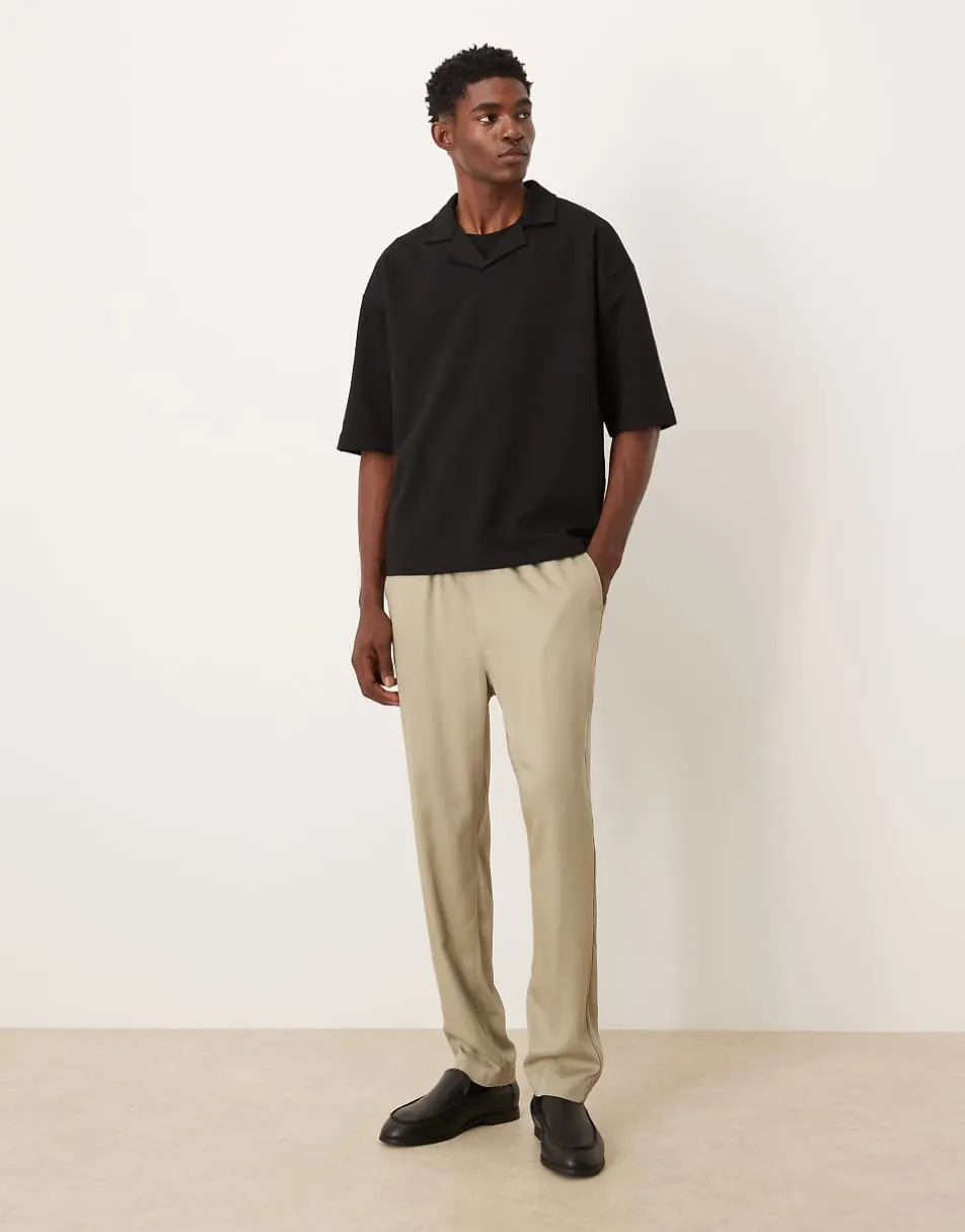 ASOS DESIGN breatheMAX™ heavyweight oversized half sleeve revere polo shirt in black cotton blend