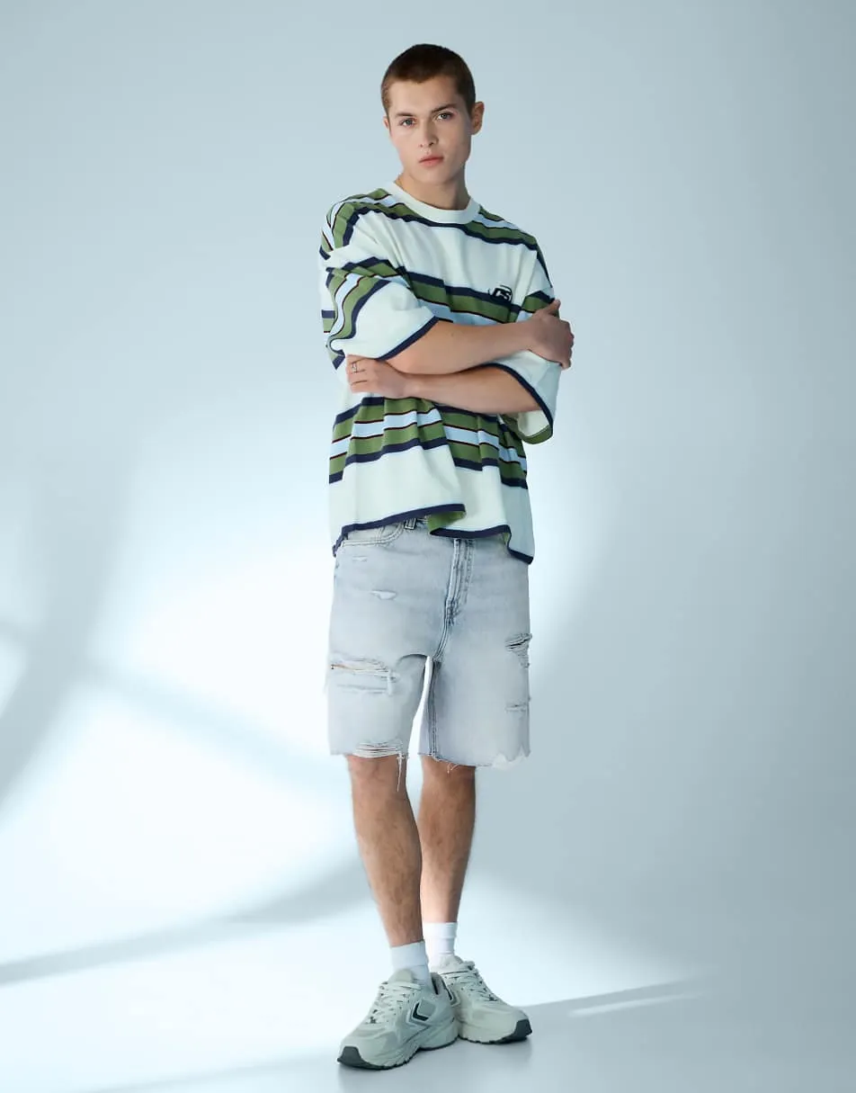 Bershka Ripped denim bermuda shorts in light bue