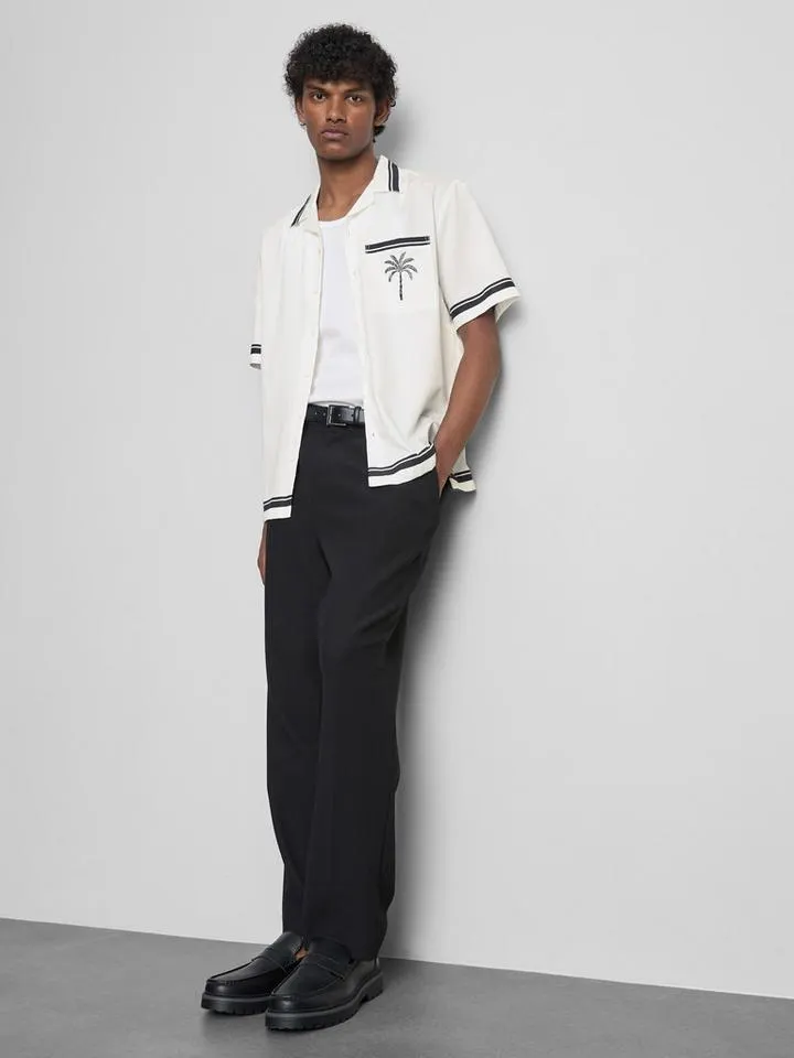 Chemise balnéaire à imprimé palmier