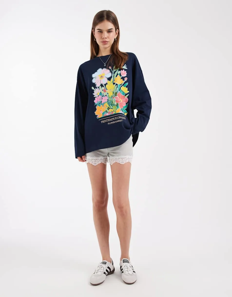 ASOS DESIGN long sleeve t-shirt with floral graphic in navy