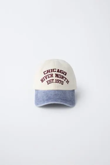 VARSITY CAP WITH EMBROIDERED SLOGAN
