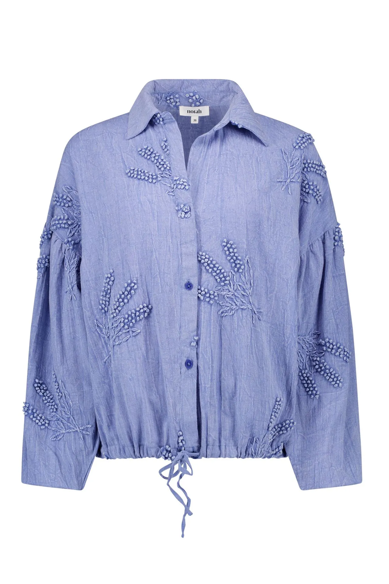 Blauwe blouse met borduursels