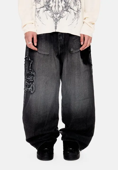 COLOSSUS - Baggy jeans - black