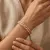 Armband in edelstaal, hartjes met zirkonia