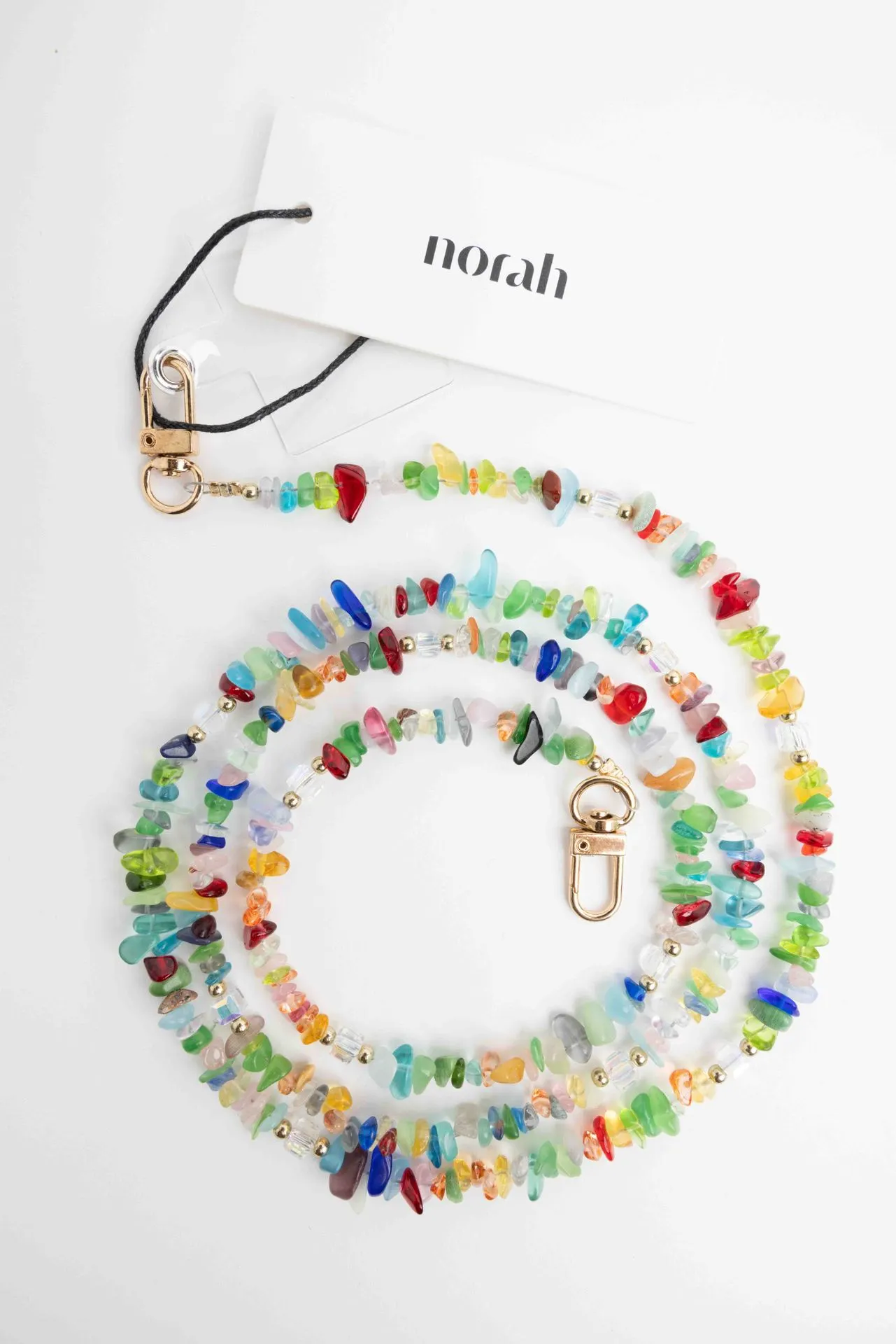 Telefoonkoord met kleurrijke kralen