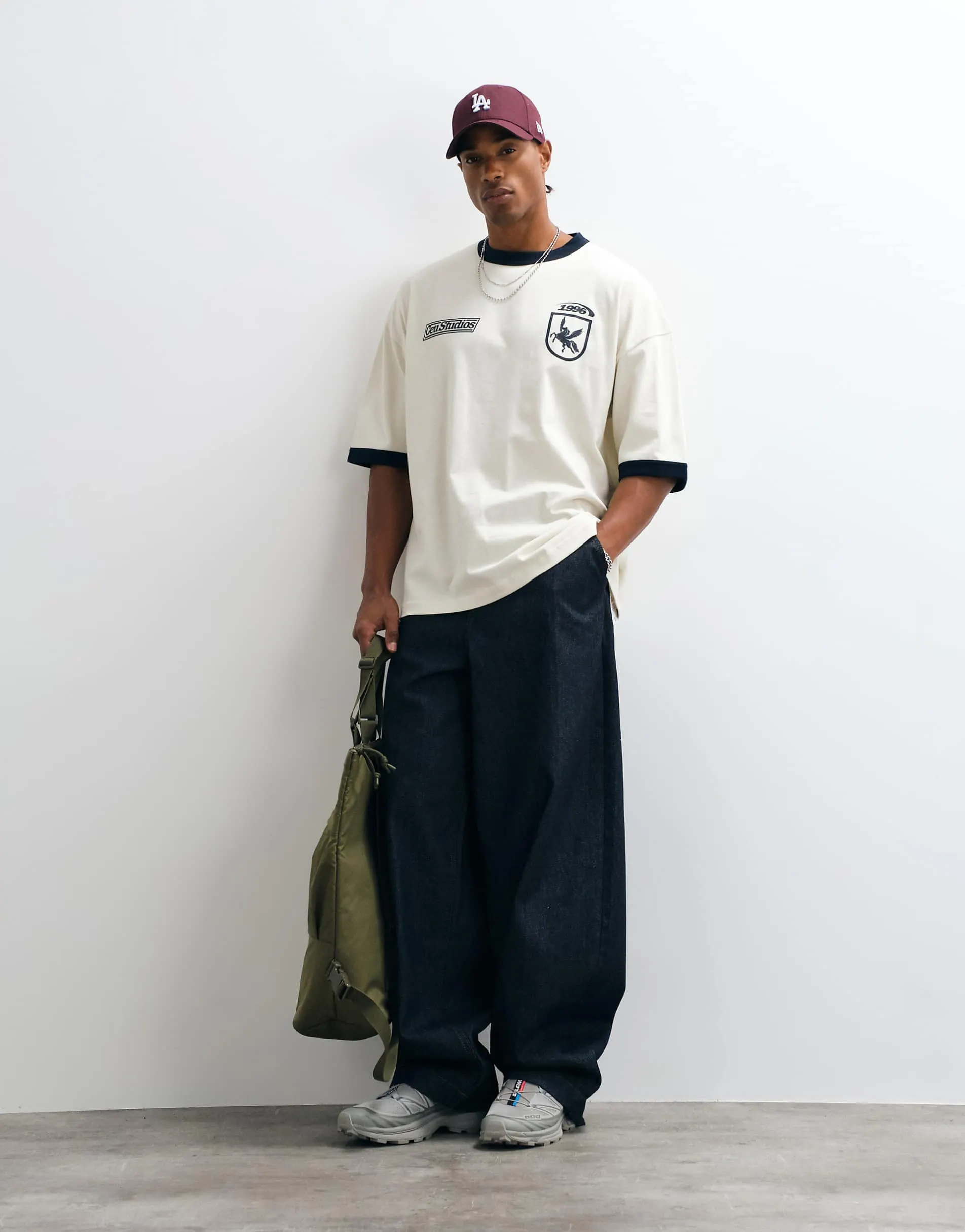 ASOS DESIGN heavyweight oversized ringer t-shirt with football graphics in cream