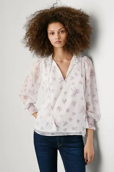 Blusa floral de manga larga