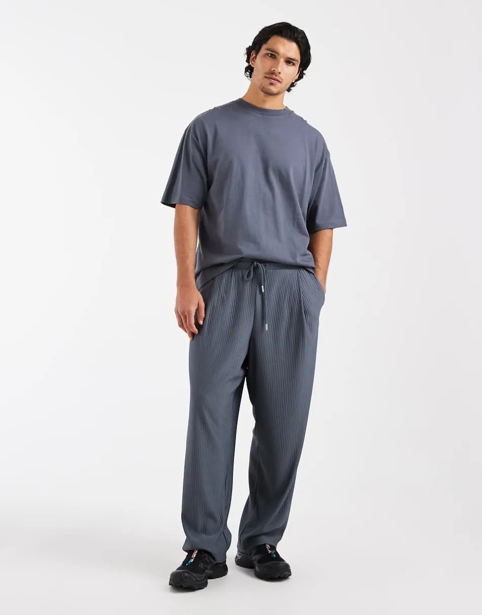 ASOS DESIGN relaxed taper pleated jogger in blue