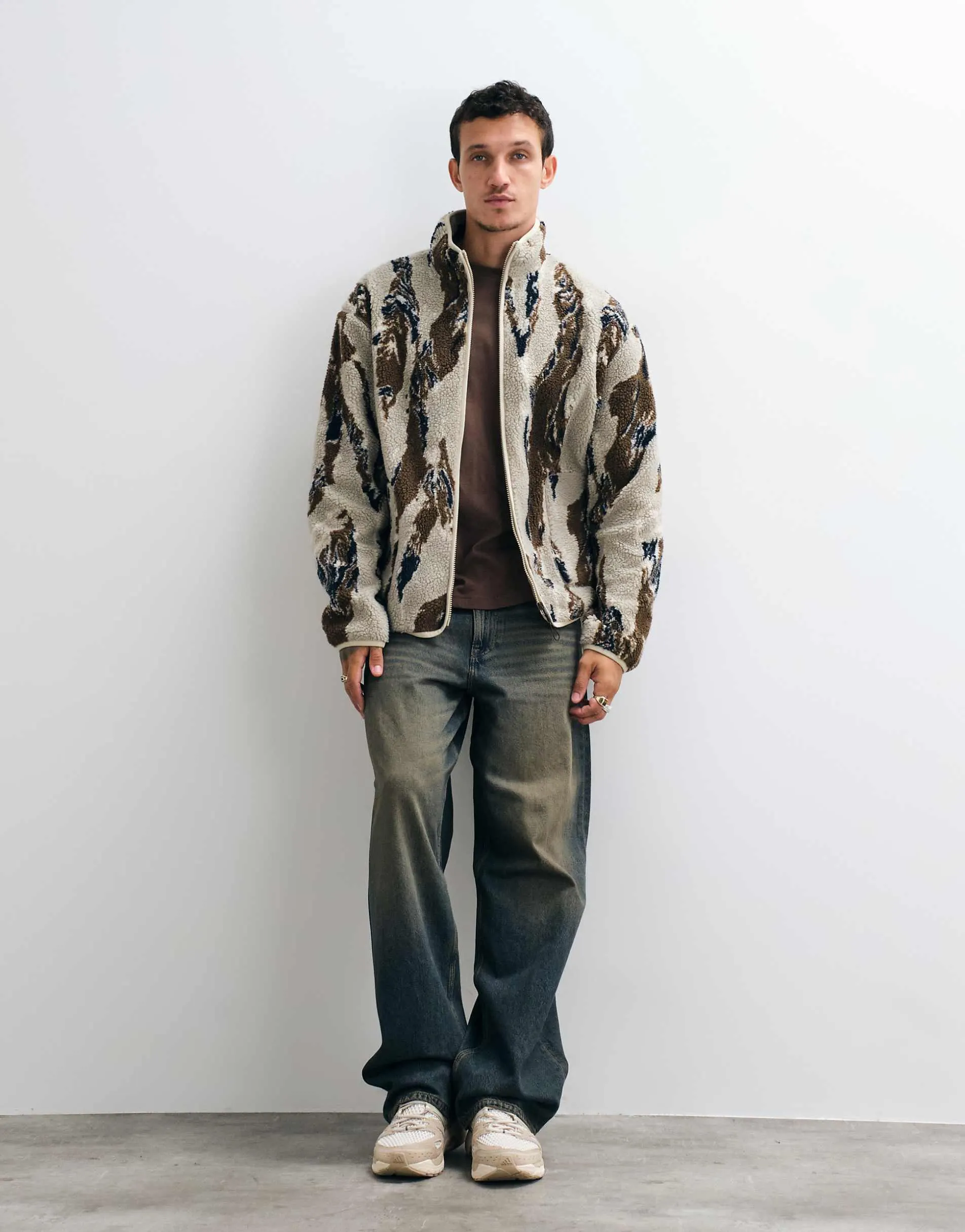ASOS DESIGN relaxed zip through borg fleece with camo print in brown