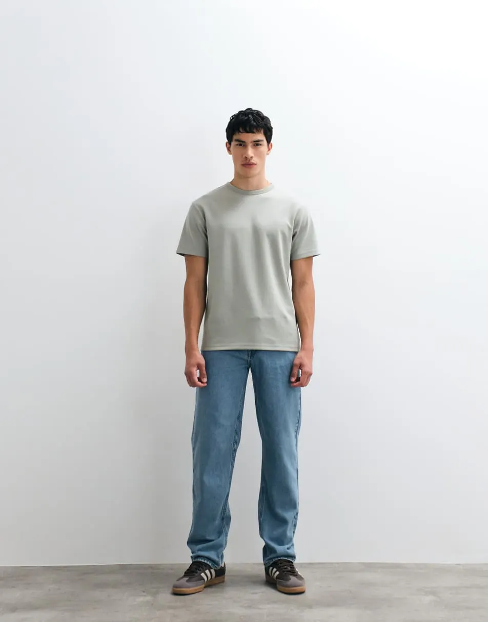 ASOS DESIGN straight leg jeans in light wash blue