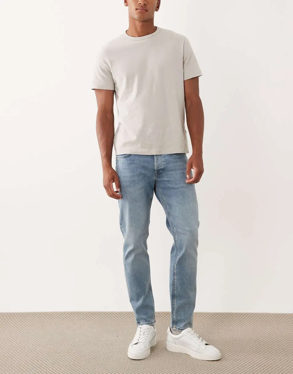 Jack & Jones Mike tapered jeans in light wash blue