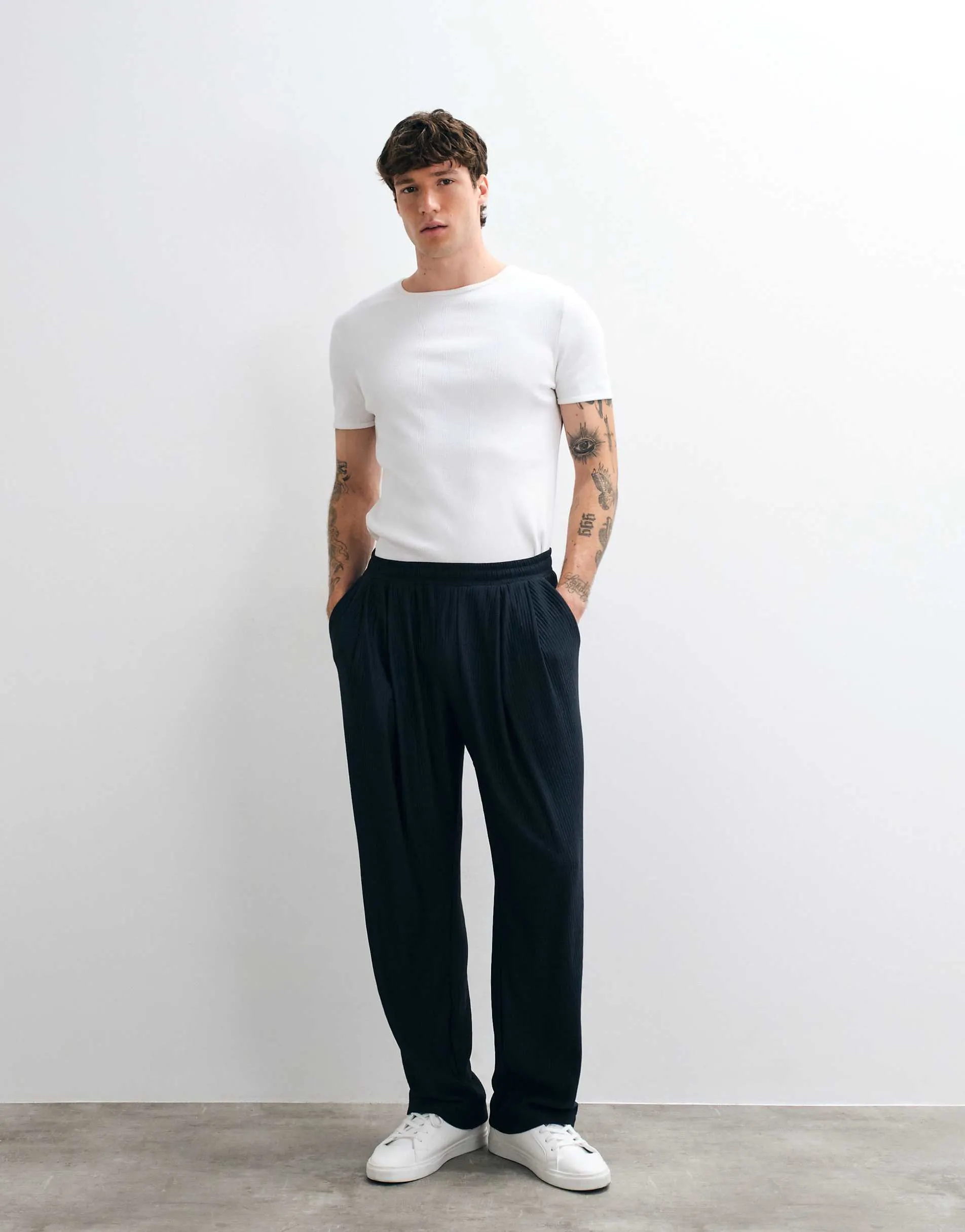 ASOS DESIGN wide leg textured plisse double pleat jogger in navy