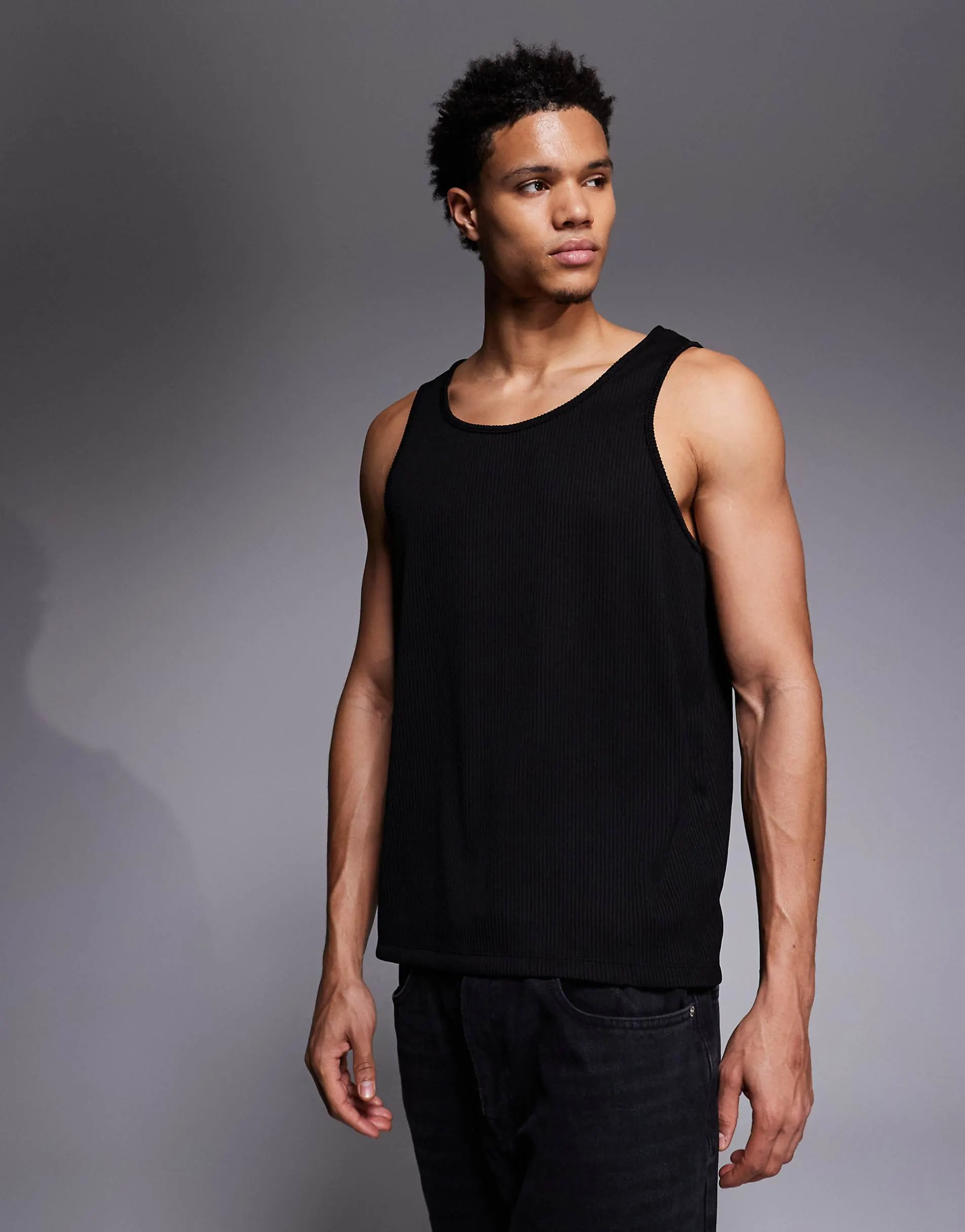 ASOS DESIGN oversized singlet in black textured rib