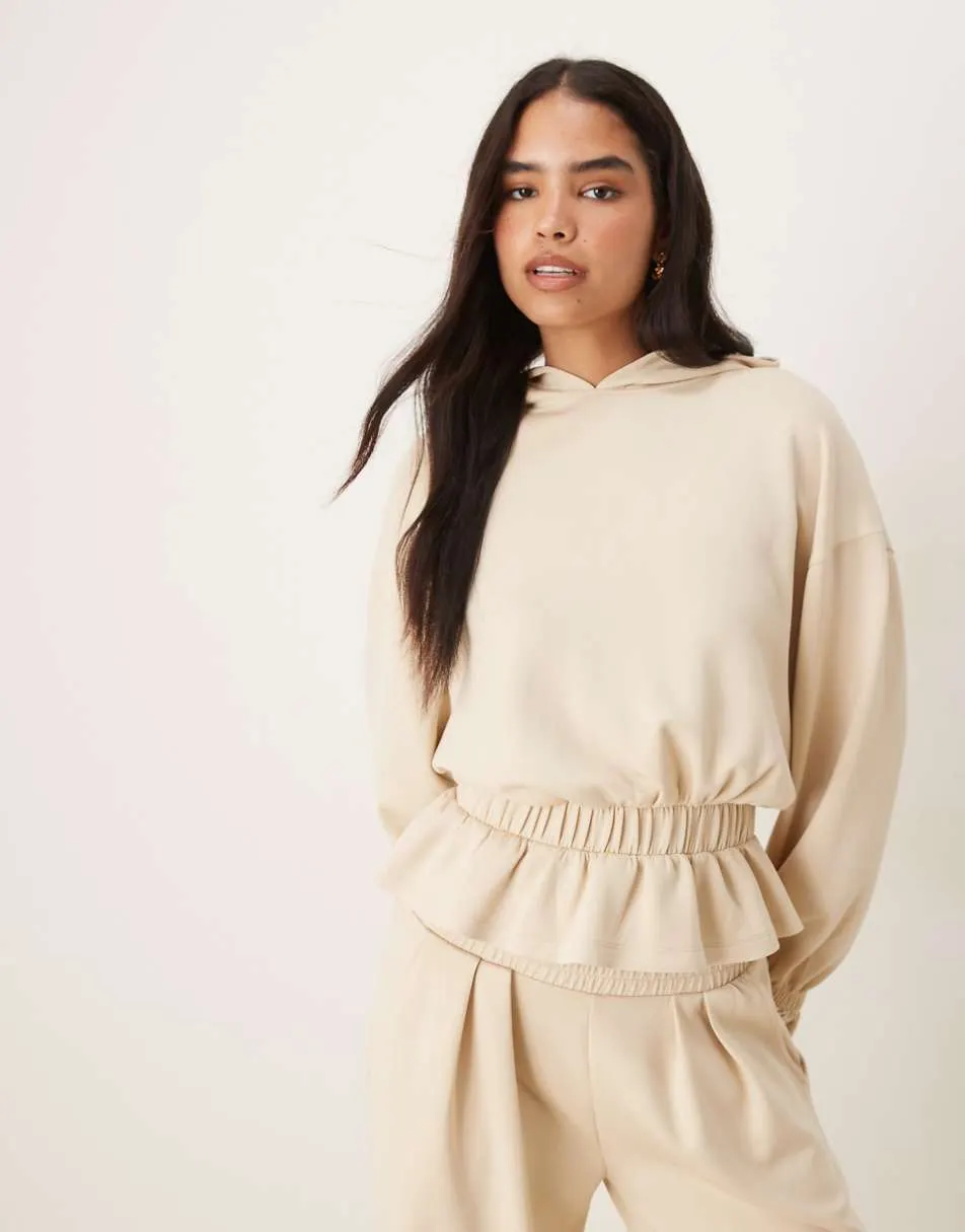 ASOS DESIGN soft touch cupro hoodie with frill hem detail in stone