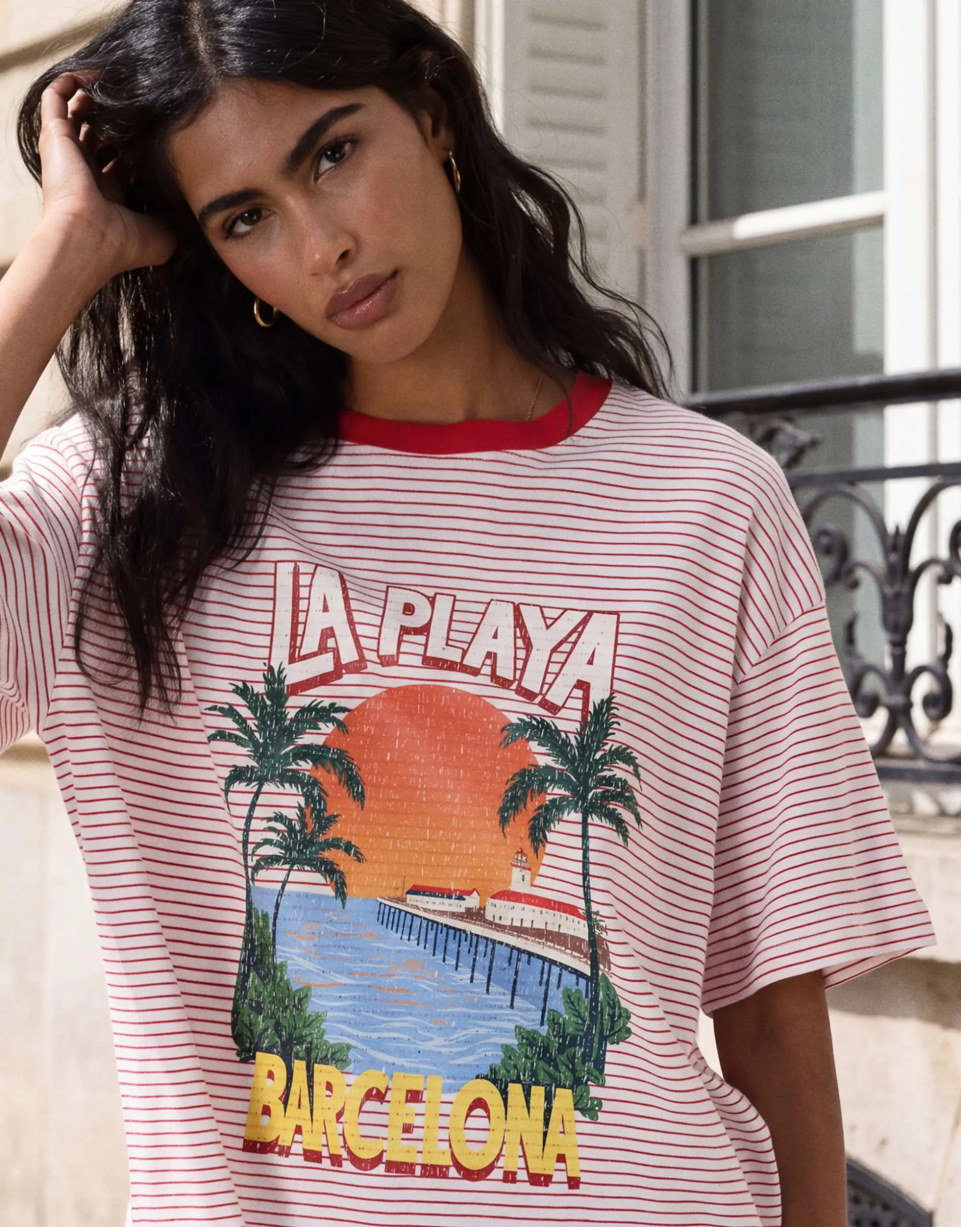 ASOS DESIGN Oversized T-shirt with La Playa graphic in red and white stripe