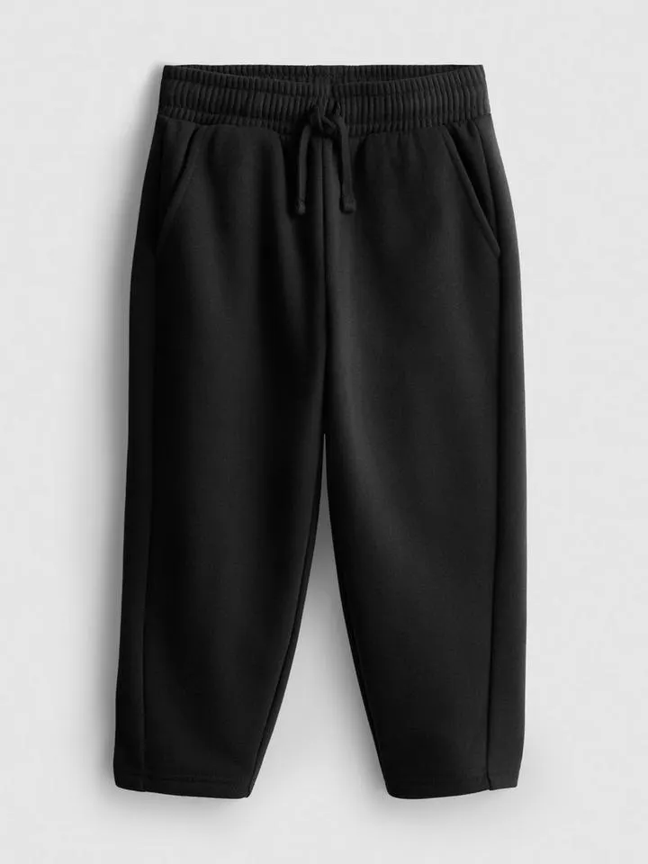 1–9 ans | Bas de jogging en coton majoritaire