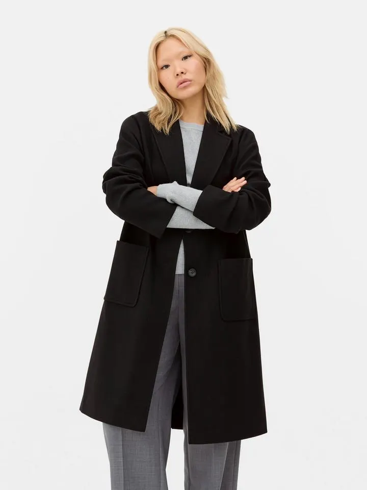 Manteau mi-long à boutonnage simple