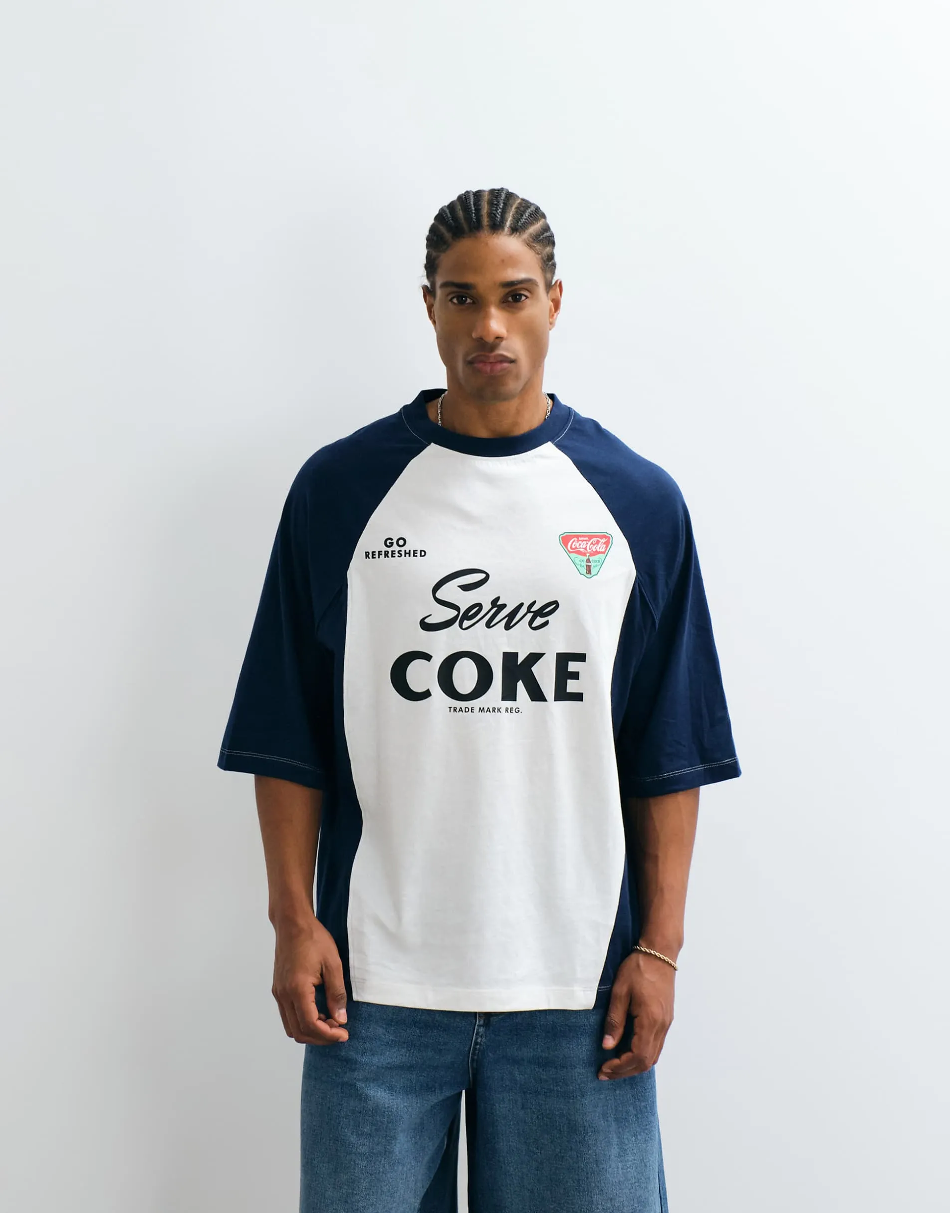 ASOS DESIGN oversized cut & sew t-shirt with Cola print in Navy