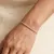Armband in goudkleurig edelstaal, 23 kristallen, fijne gourmet