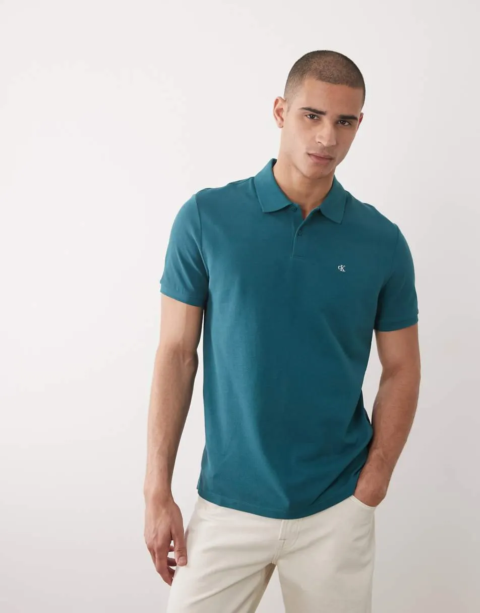 Calvin Klein Jeans monogram pique polo shirt in teal