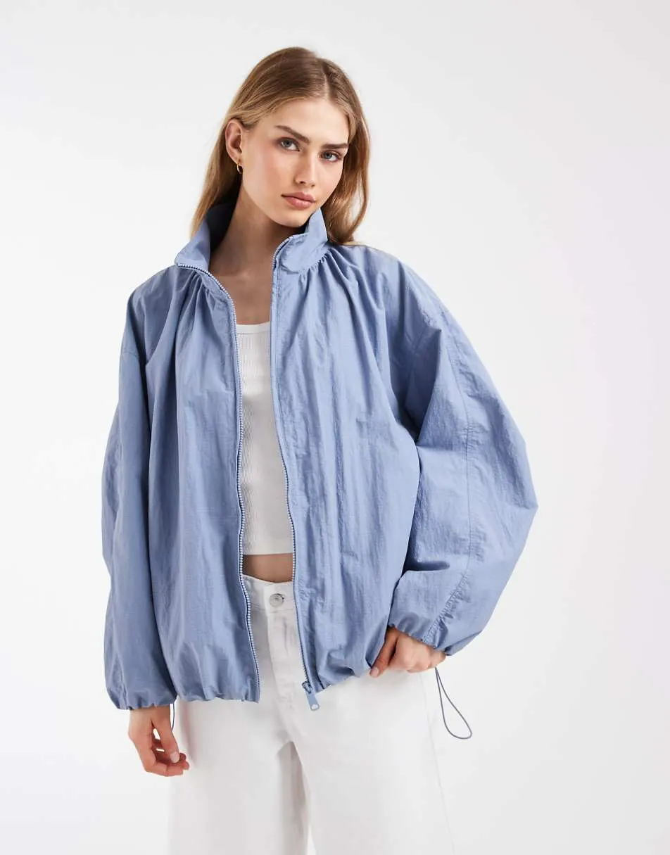 ASOS DESIGN oversized bubble hem track jacket in blue