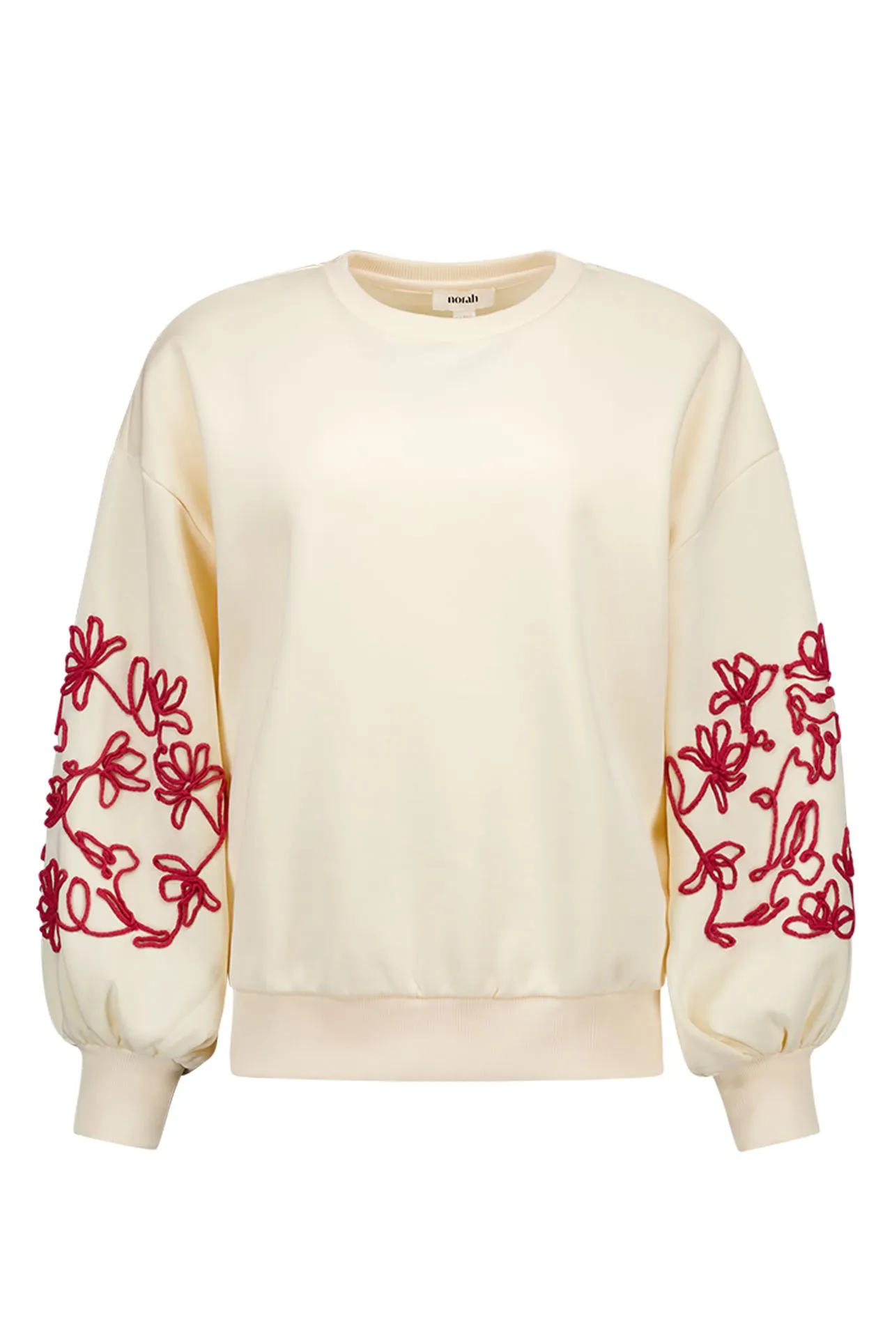 Ecru sweater met rode borduursels