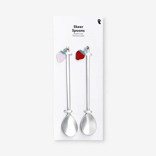 Dessert spoons with strawberry to...