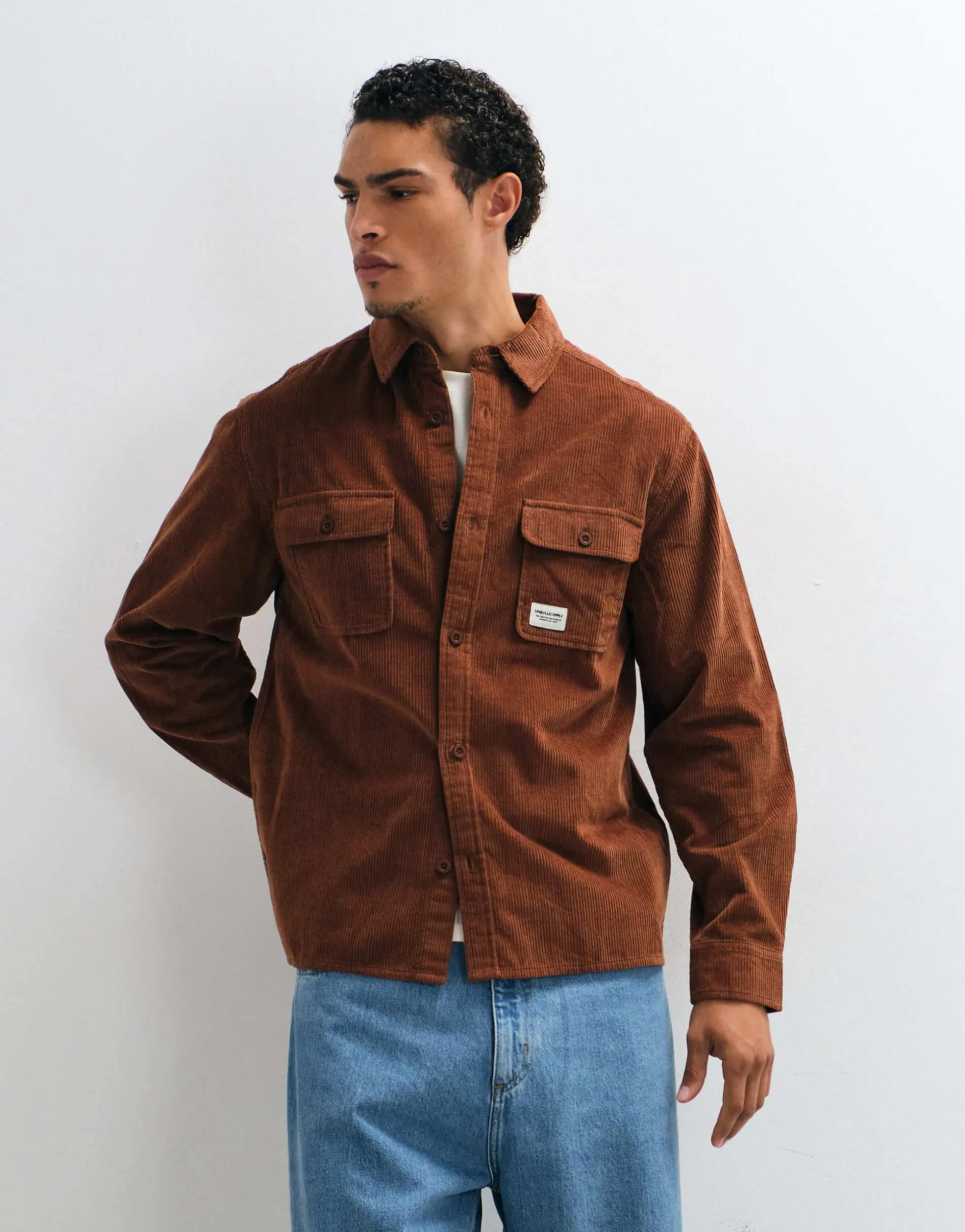 ASOS DESIGN cord overshirt with badge in dark tan