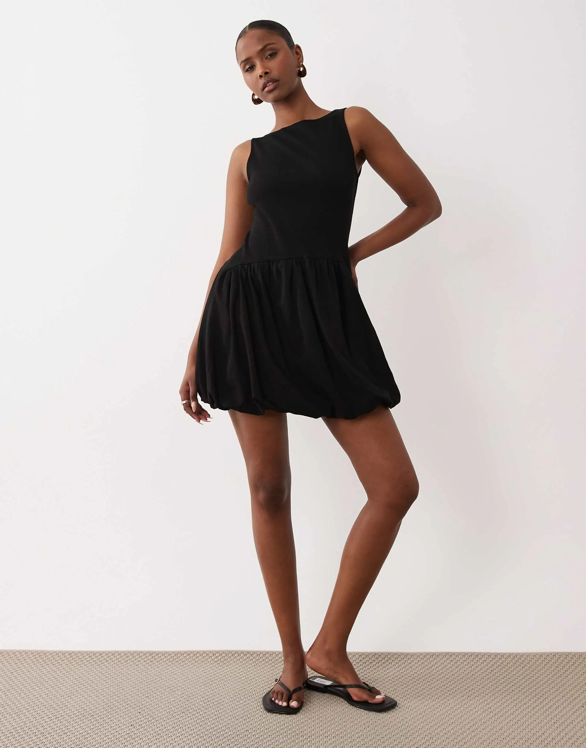 ASOS DESIGN ribbed sleeveless bubble hem mini dress in black
