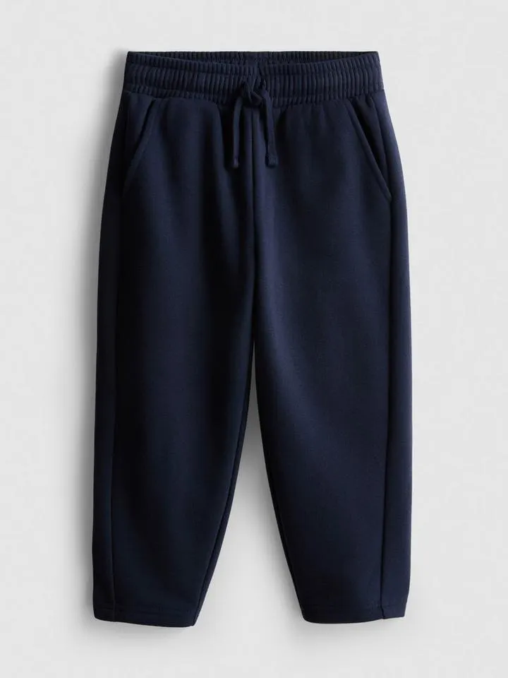 1–9 ans | Bas de jogging en coton majoritaire