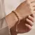 Armband in edelstaal, gedraaid ontwerp