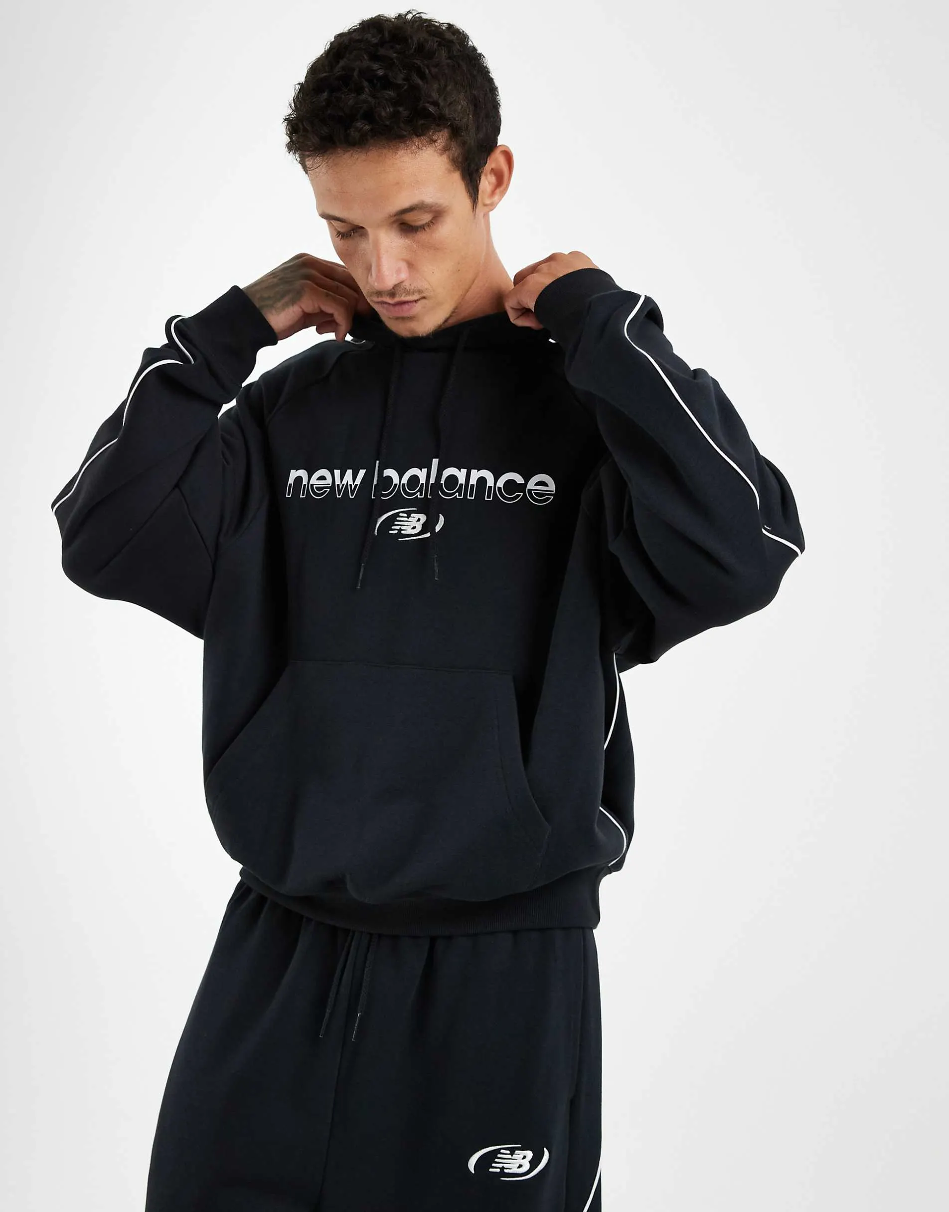 New Balance trackside french terry hoodie in black