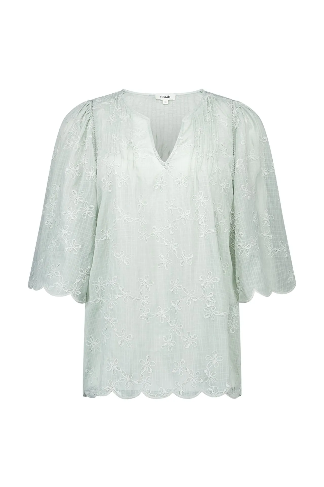 Mintkleurige blouse met borduursels