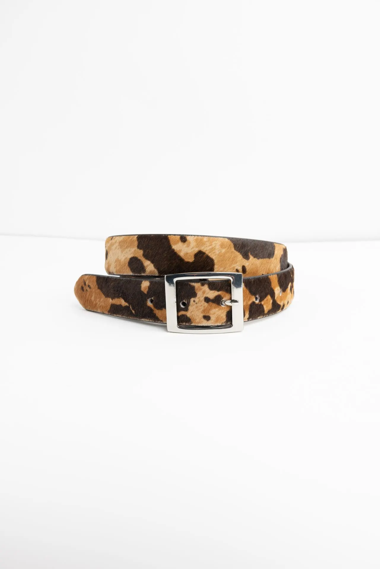 Leren riem met koeienprint