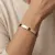 Armband in edelstaal, met motieven en zirkonia