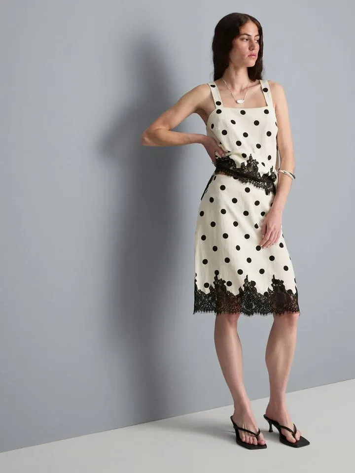 Jupe mi-longue en mélange de coton à pois et dentelle