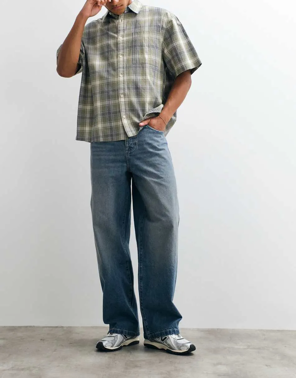 ASOS DESIGN baggy jeans in mid wash blue