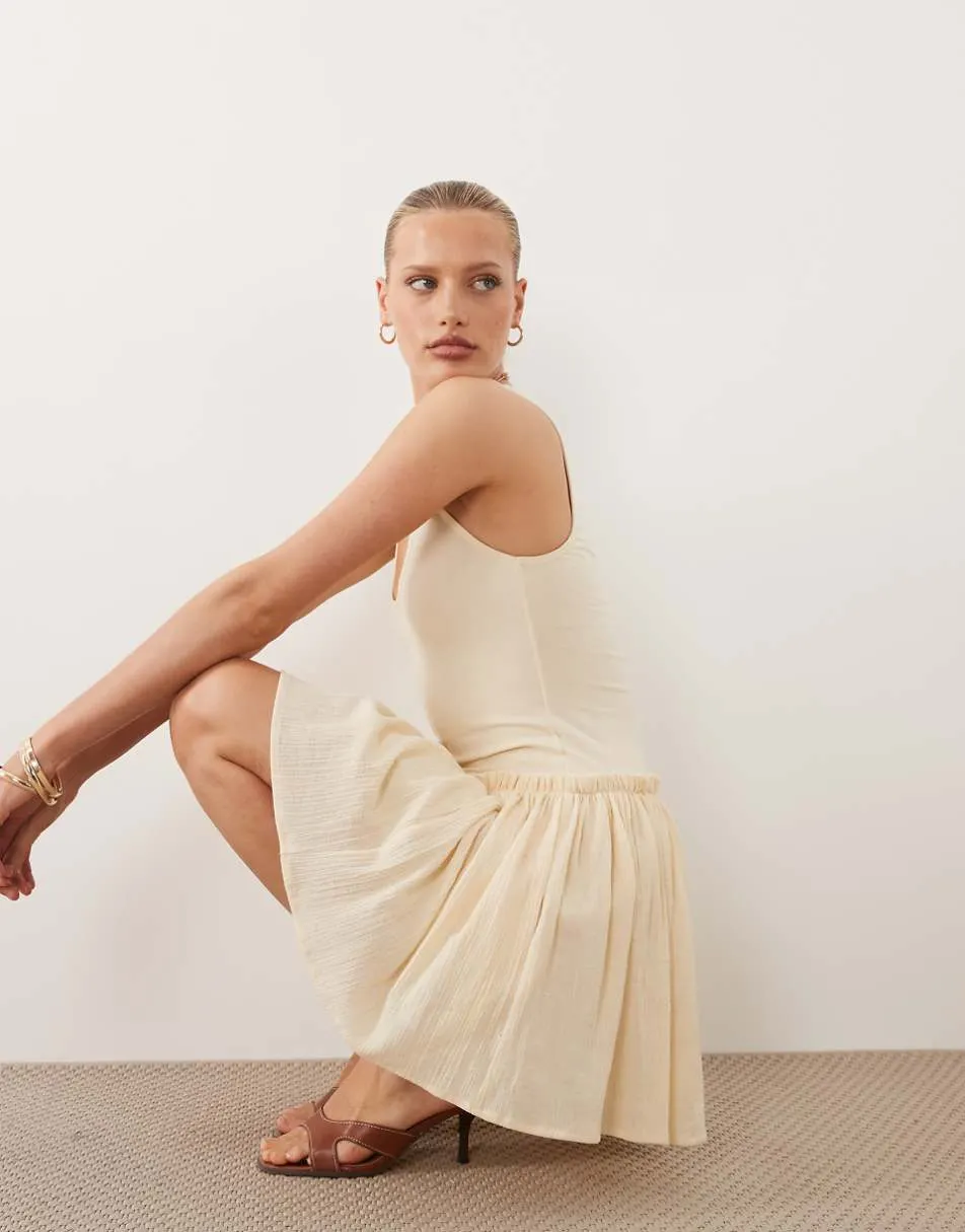 ASOS DESIGN dropped waist mini dress with crinkle cotton skirt in buttermilk