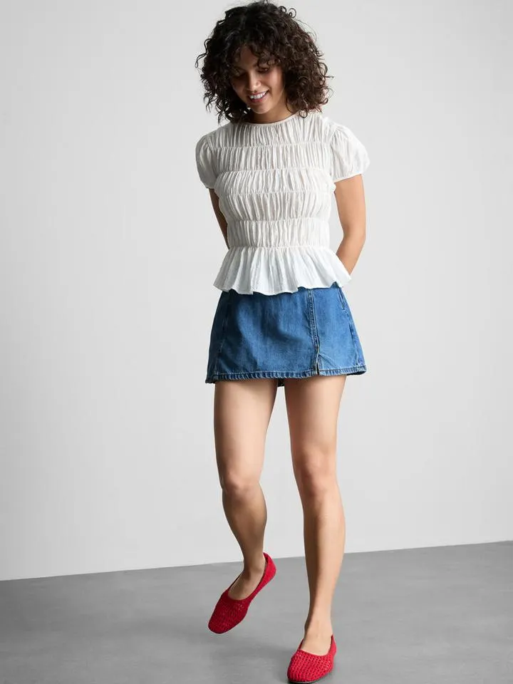 Mini jupe-short en denim de coton