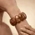 Bruine armband met gemarmerd effect