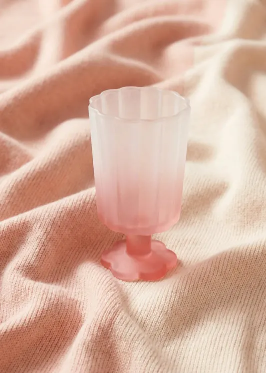 Wine glass with frosted pink fini...