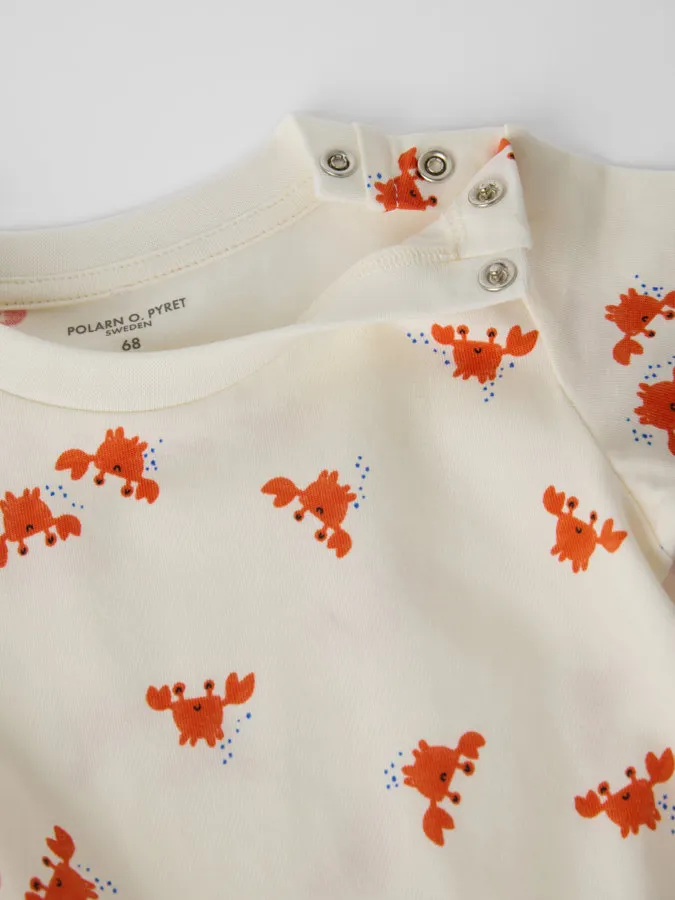 Myk økologisk bomull med lekent print