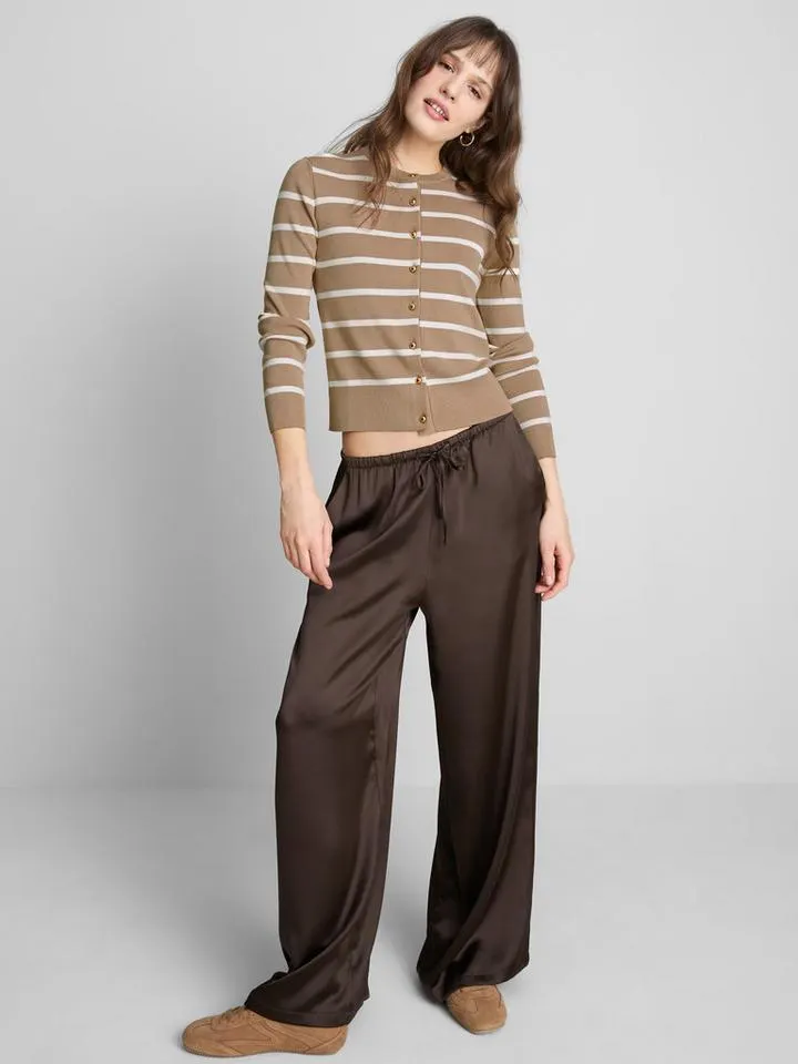 Gilet à boutons métallisés