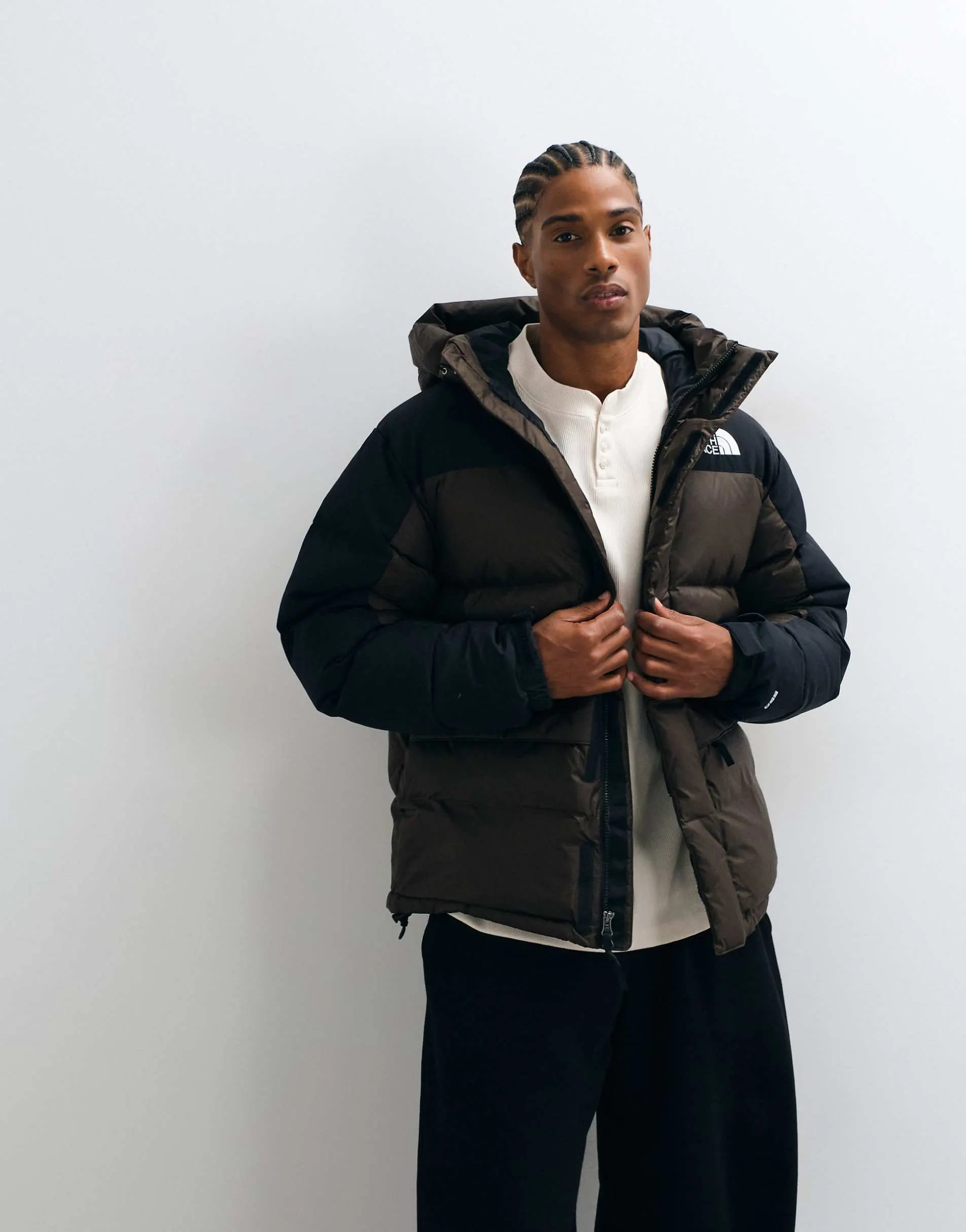 The North Face Himilayan down jacket in brown and black