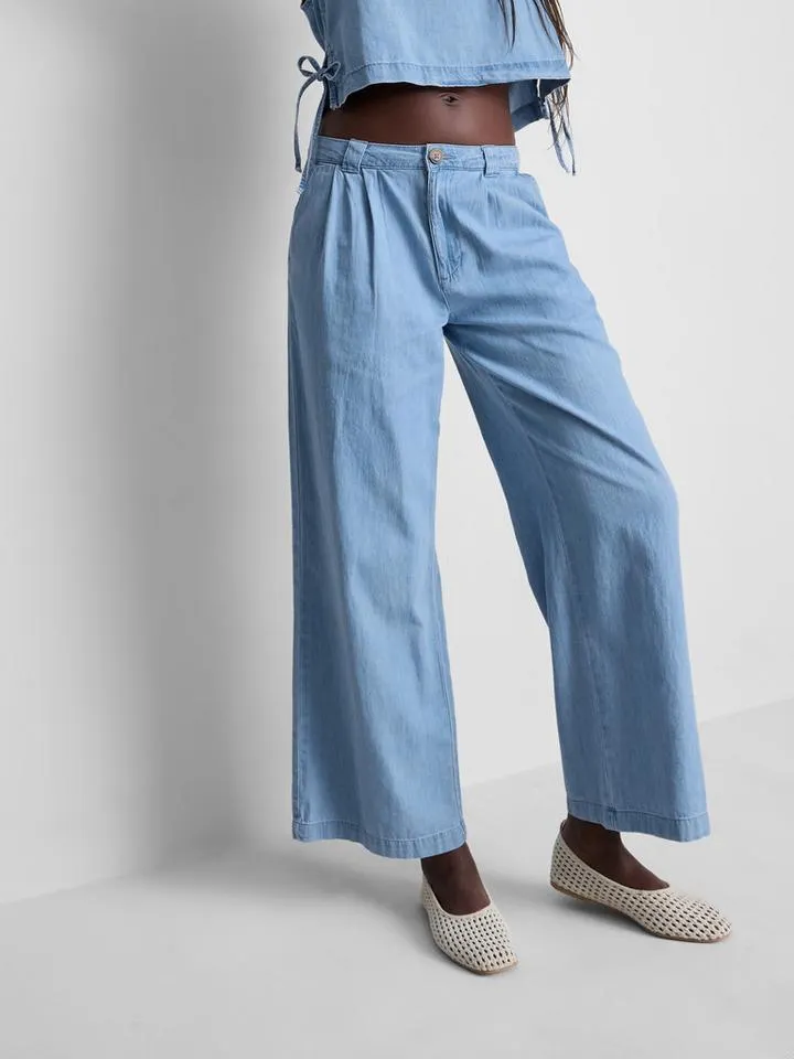 Jean large plissé en denim de coton