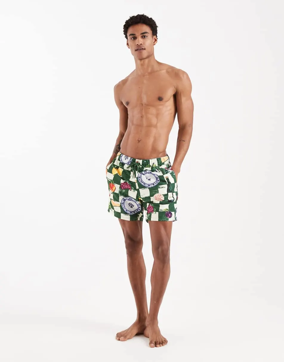 ASOS DESIGN mid length swim shorts in tile fruit print
