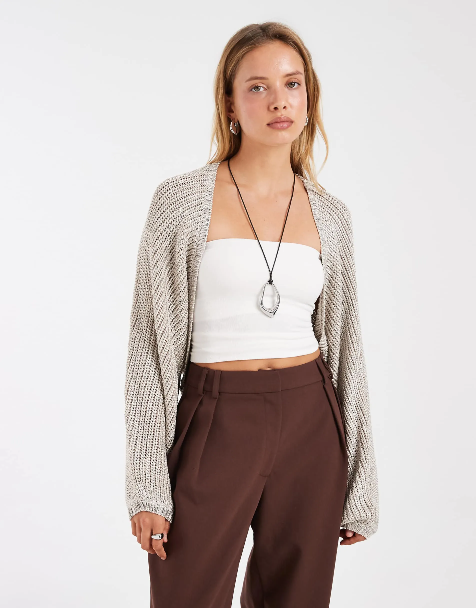 ASOS DESIGN metallic knit shrug in pale gold