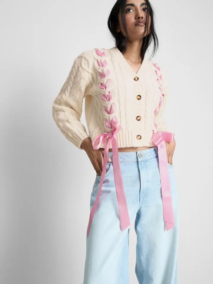 Gilet en maille torsadée à rubans